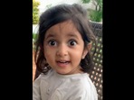 The little girl reacts to hearing dogs barking for the first time in her life. (Instagram/@tianaelizabethg) The little girl reacts to hearing dogs barking for the first time in her life. (Instagram/@tianaelizabethg)