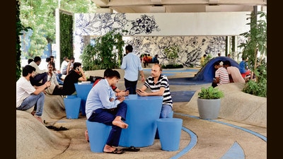 Commuters relaxing during lunch time at beautified space below Elphinstone Flyover on Senapati Bapat Marg in Mumbai, India, on Tuesday (Anshuman Poyrekar/ Hindustan Times) Commuters relaxing during lunch time at beautified space below Elphinstone Flyover on Senapati Bapat Marg in Mumbai, India, on Tuesday (Anshuman Poyrekar/ Hindustan Times)