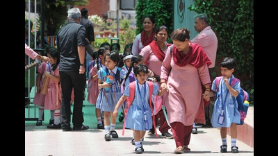 Students of Carmel Convent School, Sector 9, Chandigarh, leaving after attending physical classes that resumed on Monday after 17 days. (Ravi Kumar/HT)