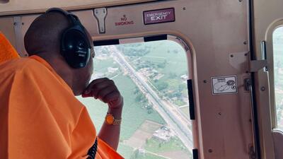 Uttar Pradesh chief minister carrying out an aerial survey of Kanwar Yatra in western districts of the state on Monday. (HT photo)