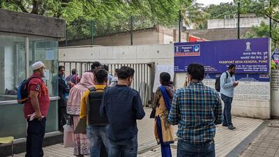 People wait outside Pune passport office in Mundhwa as the main Passport Seva Kendra (PSK) data server was down for over five hours. (Shankar Narayan/HT PHOTO) People wait outside Pune passport office in Mundhwa as the main Passport Seva Kendra (PSK) data server was down for over five hours. (Shankar Narayan/HT PHOTO)