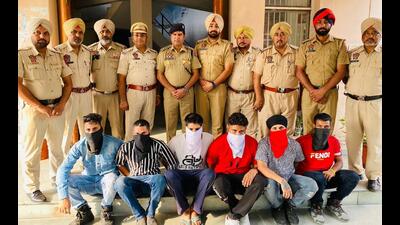 Police have arrested six history-sheeters with arms and ammunition during a raid at a house in Jalandhar’s Goraya. (HT Photo)