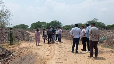 Officials inspecting Aravallis near the Bandhwari landfill on Monday. (Sourced) Officials inspecting Aravallis near the Bandhwari landfill on Monday. (Sourced)