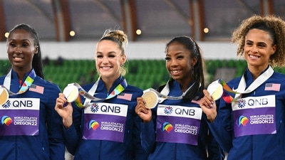 Gold medallists USA's Talitha Diggs, Abby Steiner, Britton Wilson and Sydney McLaughlin pose on the podium during the medal ceremony for the women's 4x400m relay during the World Athletics Championships. (AFP) Gold medallists USA's Talitha Diggs, Abby Steiner, Britton Wilson and Sydney McLaughlin pose on the podium during the medal ceremony for the women's 4x400m relay during the World Athletics Championships. (AFP)