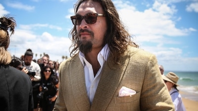 Jason Momoa at the Youth and Innovation Forum at Carcavelos beach in Oeiras, outskirts of Lisbon in June, 2022. (Photo by CARLOS COSTA / AFP) (AFP) Jason Momoa at the Youth and Innovation Forum at Carcavelos beach in Oeiras, outskirts of Lisbon in June, 2022. (Photo by CARLOS COSTA / AFP) (AFP)