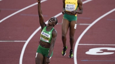 Tobi Amusan, of Nigeria, celebrates winning the women's 100-meter hurdles final at the World Athletics Championships (AP) Tobi Amusan, of Nigeria, celebrates winning the women's 100-meter hurdles final at the World Athletics Championships (AP)