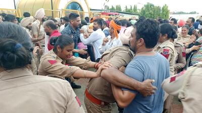 One of the women protesters fell unconscious and was shifted to the local civil hospital. (HT Photo)