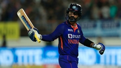 Dinesh Karthik raises his bat after scoring a fifty for India. (Getty) Dinesh Karthik raises his bat after scoring a fifty for India. (Getty)