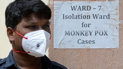 A security guard stands at the entrance of an isolation ward for monkeypox patients at a government hospital in Hyderabad on July 25, 2022. (AFP) A security guard stands at the entrance of an isolation ward for monkeypox patients at a government hospital in Hyderabad on July 25, 2022. (AFP)