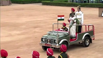 President Droupadi Murmu inspects Tri Services Guard of Honour at Rashtrapati Bhavan. (ANI)