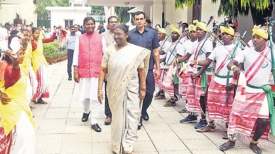 New Delhi, India - July 24, 2022: India's President Elect Droupadi Murmu interacts with folk performers at her temporary residence, in New Delhi, India, on Sunday, July 24, 2022. (HT Photo)