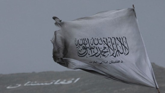 The Taliban flag is seen in a marketplace in Kabul, Afghanistan.(REUTERS)