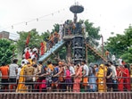 Devotees thronged Shiva temples around the country to perform ‘Jalabhishek (offer holy water to Shivalingam)’ of Lord Shiva as the Shivaratri of Sawan month is being celebrated after two years of the pandemic, while the police administration has made tight security arrangements.(PTI)