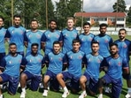 The French cricket team pose for a team photo.