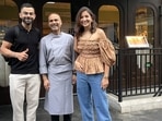Anushka Sharma and Virat Kohli posing with a chef in London.