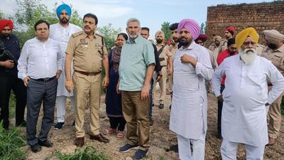 Punjab minister Lal Chand Kataruchak inspecting the Walipur Kalan village on Tuesday. (HT Photo)