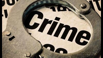 Two persons have been charged with murder for the killing on Sunday of two Indo-Canadians in British Columbia, including a prominent gangster.