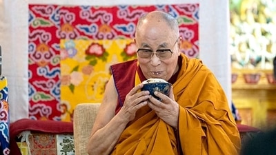 Tibetan spiritual leader the Dalai Lama enjoying a traditional rice dish during the welcome ceremony on his arrival at his residence in Leh. (ANI) Tibetan spiritual leader the Dalai Lama enjoying a traditional rice dish during the welcome ceremony on his arrival at his residence in Leh. (ANI)