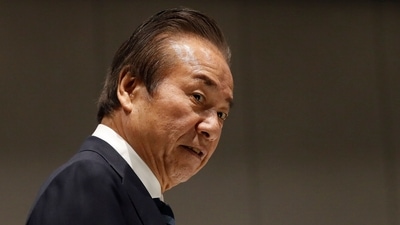 Haruyuki Takahashi arriving to attend a Tokyo 2020 executive board meeting. (AFP)