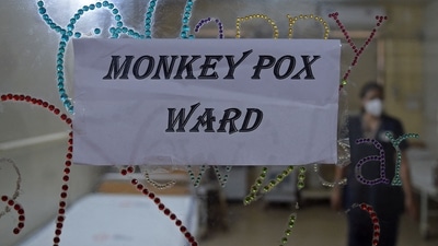 A health worker walks inside an isolation ward built as a precautionary measure for monkeypox patients at a civil hospital, Ahmedabad, July 25, 2022 (AFP)