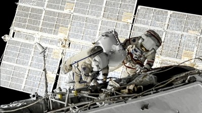FILE - In this June 2, 2021 file image taken from Roscosmos video, Russian cosmonauts Oleg Novitsky, right, and Pyotr Dubrov, members of the crew to the International Space Station (ISS), perform their first spacewalk to replace old batteries outside the International Space Station. (AP) FILE - In this June 2, 2021 file image taken from Roscosmos video, Russian cosmonauts Oleg Novitsky, right, and Pyotr Dubrov, members of the crew to the International Space Station (ISS), perform their first spacewalk to replace old batteries outside the International Space Station. (AP)
