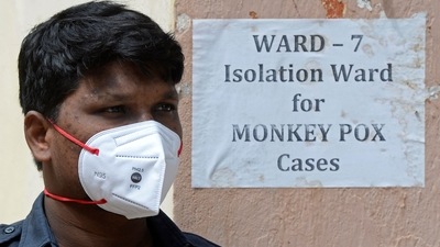 A security guard stands at the entrance of an isolation ward for monkeypox patients at a government hospital in Hyderabad. (AFP) A security guard stands at the entrance of an isolation ward for monkeypox patients at a government hospital in Hyderabad. (AFP)
