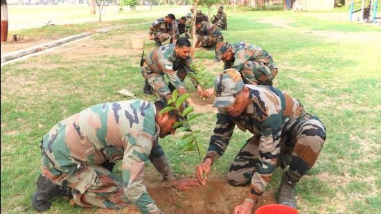 Army officials said the plants include fruit-bearing, oxygen-generating and ornamental trees that were planted (HT PHOTO)