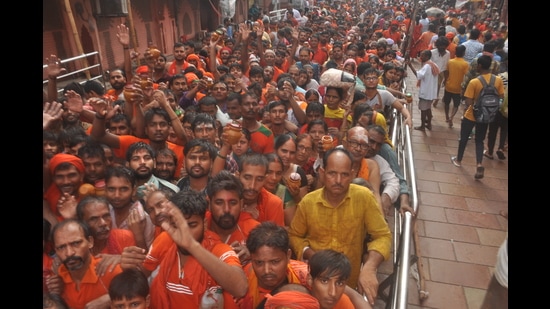 Kanwariyas in Varanasi to worship Baba Kashi Vishwanath on Monday. (HT Photo)