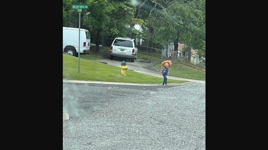 The image shows a kid dressed as a Chucky doll roaming in an US neighbourhood.(Facebook/@Kendra Walden)