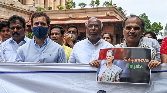 "We're protesting as per the instruction of the police. All of this is a conspiracy by PM Modi & Amit Shah to completely destroy the Opposition and muzzle our voices. We won't be scared, our fight will continue," Congress leader and LoP Mallikarjun Kharge said.(AFP)