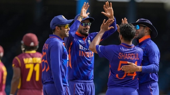 India's captain Shikhar Dhawan scores runs against West Indies during the first ODI cricket match at Queen's Park Oval in Port of Spain, Trinidad and Tobago.(AP)