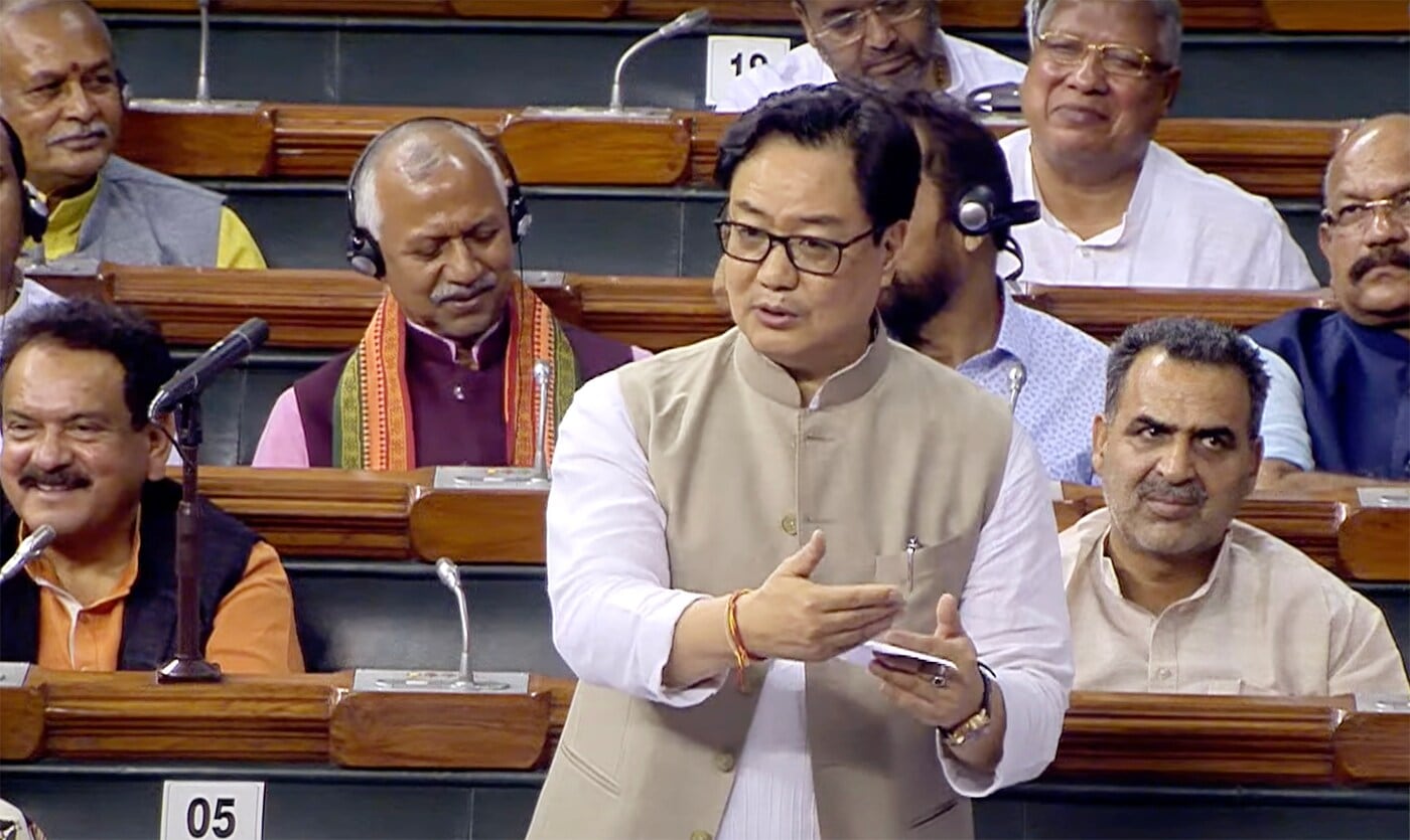 Union law and justice minister Kiren Rijiju speaks in the Lok Sabha during the monsoon session of Parliament, in New Delhi on Tuesday. (ANI Photo/Sansad TV) Union law and justice minister Kiren Rijiju speaks in the Lok Sabha during the monsoon session of Parliament, in New Delhi on Tuesday. (ANI Photo/Sansad TV)