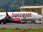 The Delhi-bound SpiceJet airplane following its emergency landing after it catches fire mid-air at Jayprakash Narayan Airport in Patna on Sunday. The Delhi-bound SpiceJet airplane following its emergency landing after it catches fire mid-air at Jayprakash Narayan Airport in Patna on Sunday. 