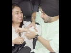 Screengrab from the video where Neha Kakkar gets her first tattoo that is dedicated to her husband Rohanpreet Singh. (Instagram/@nehakakkar) Screengrab from the video where Neha Kakkar gets her first tattoo that is dedicated to her husband Rohanpreet Singh. (Instagram/@nehakakkar)