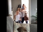 The image, taken from the Reddit video, shows the kids looking at the dog.