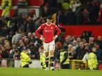 Manchester United's Cristiano Ronaldo walks at the end of a Premier League soccer match.