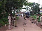 Caption: "Police deployed in Puttur after BJP youth wing worker Praveen Nettaru's murder in Bellare. (ANI Image)" Caption: "Police deployed in Puttur after BJP youth wing worker Praveen Nettaru's murder in Bellare. (ANI Image)"