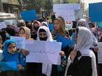 FILE - Afghan women chant and hold signs of protest during a demonstration in Kabul, Afghanistan.(AP) FILE - Afghan women chant and hold signs of protest during a demonstration in Kabul, Afghanistan.(AP)