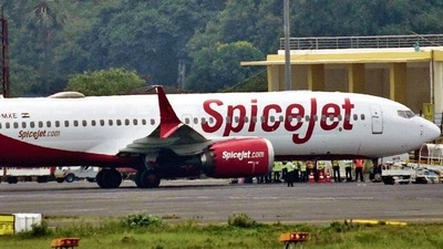 The Delhi-bound SpiceJet airplane following its emergency landing after it catches fire mid-air at Jayprakash Narayan Airport in Patna on Sunday. (HT photo) The Delhi-bound SpiceJet airplane following its emergency landing after it catches fire mid-air at Jayprakash Narayan Airport in Patna on Sunday. (HT photo)
