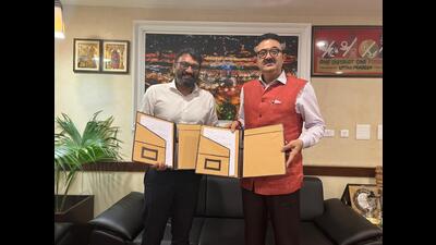 ACS MSME and Export Promotion Department Navneet Sehgal exchanging the MoU with KOO APP co-founder Aprameya Radhakrishna . (Sourced)