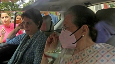 Congress Interim President Sonia Gandhi accompanied by party leader Priyanka Gandhi leaves her residence for the ED office for the 3rd day of questioning in the National Herald case, (ANI) Congress Interim President Sonia Gandhi accompanied by party leader Priyanka Gandhi leaves her residence for the ED office for the 3rd day of questioning in the National Herald case, (ANI)