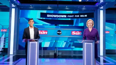 Liz Truss and Rishi Sunak take questions from the Sun readers at TalkTV's Ealing Studios, west London, during the Conservative Party leadership debate. (AP)