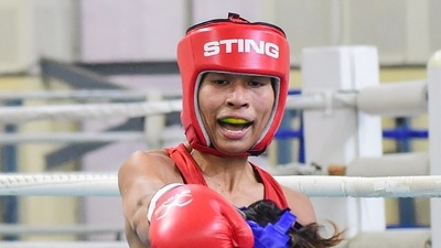 &nbsp;Olympic medalist boxer Lovlina Borgohain (in red)&nbsp; (PTI)