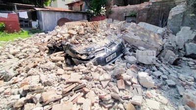 A car is burried under debris from a ruined old house in Vigan city, Ilocos Sur province north of Manila after a 7.0-magnitude earthquake hit the northern Philippines. (AFP) A car is burried under debris from a ruined old house in Vigan city, Ilocos Sur province north of Manila after a 7.0-magnitude earthquake hit the northern Philippines. (AFP)