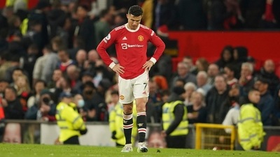 Manchester United's Cristiano Ronaldo walks at the end of a Premier League soccer match. (AP)
