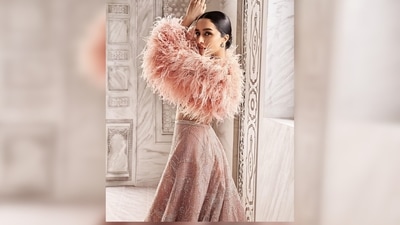 Shraddha Kapoor's couture comes with a backless sequinned blouse, a lehenga and a fur stole. (Instagram/@shraddhakapoor) Shraddha Kapoor's couture comes with a backless sequinned blouse, a lehenga and a fur stole. (Instagram/@shraddhakapoor)
