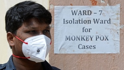 A security guard stands at the entrance of an isolation ward for monkeypox patients at a government hospital in Hyderabad on July 25, 2022. (AFP) A security guard stands at the entrance of an isolation ward for monkeypox patients at a government hospital in Hyderabad on July 25, 2022. (AFP)