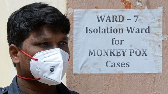A security guard stands at the entrance of an isolation ward for monkeypox patients at a government hospital in Hyderabad.(AFP) A security guard stands at the entrance of an isolation ward for monkeypox patients at a government hospital in Hyderabad.(AFP)