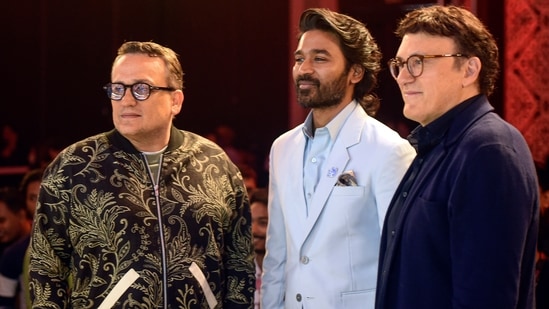 Anthony Russo and Joe Russo with Dhanush during a press conference of The Gray Man in Mumbai. (PTI)(PTI)