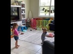 A screengrab of the video shared on Instagram showcases the little girl encouraging her younger brother to take his first steps. A screengrab of the video shared on Instagram showcases the little girl encouraging her younger brother to take his first steps.